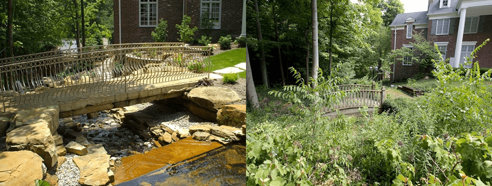 Stone bridge with metal railing over a small creek beside a brick building, surrounded by trees and greenery.